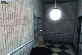 In game image of Hitman - Codename 47 on the Microsoft Windows.