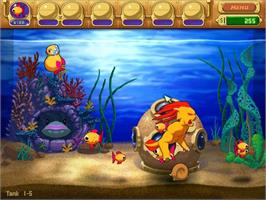 In game image of Insaniquarium! Deluxe on the Microsoft Windows.