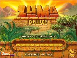 Title screen of Zuma Deluxe on the Microsoft Windows.