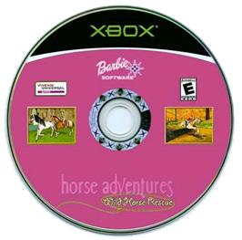 Artwork on the CD for Barbie Horse Adventures - Wild Horse Rescue on the Microsoft Xbox.