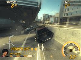 In game image of FlatOut 2 on the Microsoft Xbox.