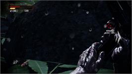 In game image of Rambo - The Video Game on the Microsoft Xbox 360.