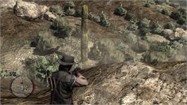 In game image of Red Dead Redemption on the Microsoft Xbox 360.