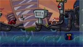 In game image of Worms 2 - Armageddon on the Microsoft Xbox 360.
