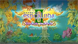 Title screen of Espgaluda 2 Black Label on the Microsoft Xbox 360.