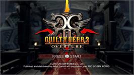 Title screen of Guilty Gear 2 Overture on the Microsoft Xbox 360.