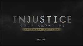 Title screen of Injustice: Gods Among Us on the Microsoft Xbox 360.
