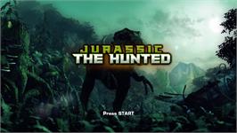 Title screen of Jurassic - The Hunted on the Microsoft Xbox 360.