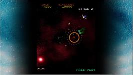 In game image of Gyruss on the Microsoft Xbox Live Arcade.