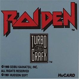 Top of cartridge artwork for Raiden on the NEC TurboGrafx-16.