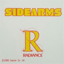 Top of cartridge artwork for Side Arms on the NEC TurboGrafx-16.