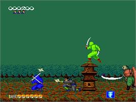 In game image of Shinobi on the NEC TurboGrafx-16.