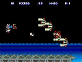 In game image of Side Arms on the NEC TurboGrafx-16.