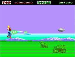 In game image of Space Harrier on the NEC TurboGrafx-16.