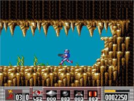 In game image of Turrican on the NEC TurboGrafx-16.
