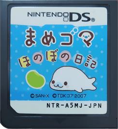 Cartridge artwork for Mame Goma - Honobono Nikki on the Nintendo DS.