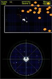 In game image of Geometry Wars Galaxies on the Nintendo DS.