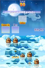 In game image of Whac-a-mole on the Nintendo DS.