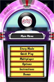 Title screen of Grease - Le Jeu Vidéo Officiel on the Nintendo DS.