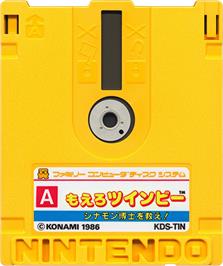 Cartridge artwork for Moero TwinBee - Cinnamon Hakase wo Sukue! on the Nintendo Famicom Disk System.