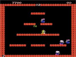 In game image of Bubble Bobble on the Nintendo Famicom Disk System.