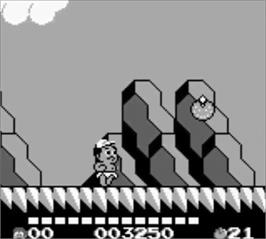 In game image of Adventure Island II - Aliens in Paradise on the Nintendo Game Boy.