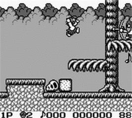In game image of Genjin Cottsu on the Nintendo Game Boy.