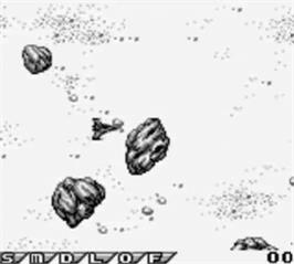 In game image of Gradius: The Interstellar Assault on the Nintendo Game Boy.