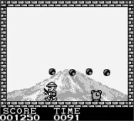 In game image of Pang on the Nintendo Game Boy.