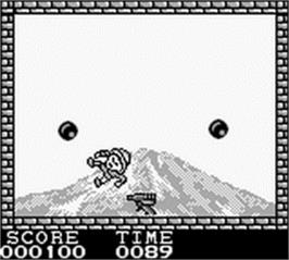 In game image of Pang on the Nintendo Game Boy.