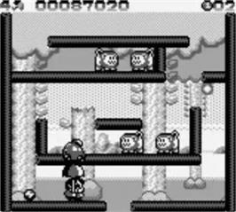In game image of Parasol Stars: The Story of Bubble Bobble III on the Nintendo Game Boy.