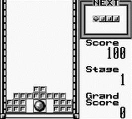 In game image of Tetris Blast on the Nintendo Game Boy.