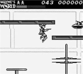 In game image of Wayne's World on the Nintendo Game Boy.