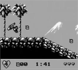 In game image of We're Back! - A Dinosaur's Story on the Nintendo Game Boy.
