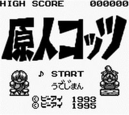 Title screen of Genjin Cottsu on the Nintendo Game Boy.