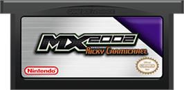 Cartridge artwork for MX 2002 featuring Ricky Carmichael on the Nintendo Game Boy Advance.
