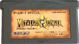 Cartridge artwork for Metalgun Slinger on the Nintendo Game Boy Advance.