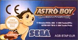 Top of cartridge artwork for Astro Boy: Omega Factor on the Nintendo Game Boy Advance.