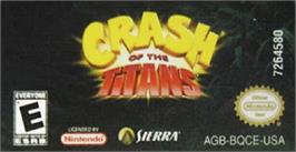 Top of cartridge artwork for Crash of the Titans on the Nintendo Game Boy Advance.