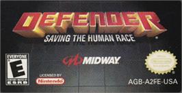 Top of cartridge artwork for Defender on the Nintendo Game Boy Advance.