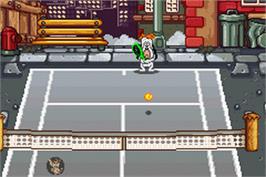 In game image of Droopy's Tennis Open on the Nintendo Game Boy Advance.