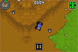 In game image of Monster Jam: Maximum Destruction on the Nintendo Game Boy Advance.