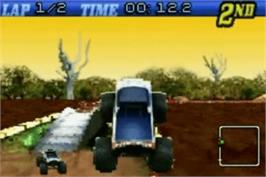 In game image of Monster Trucks on the Nintendo Game Boy Advance.