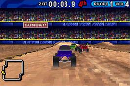 In game image of Monster Trucks Mayhem on the Nintendo Game Boy Advance.