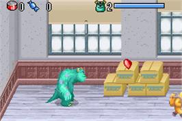 In game image of Monsters Inc. on the Nintendo Game Boy Advance.