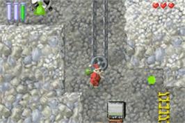 In game image of Santa Claus Saves The Earth on the Nintendo Game Boy Advance.