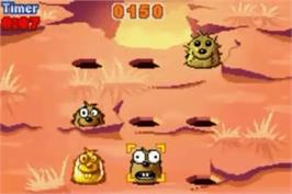 In game image of Whac-A-Mole on the Nintendo Game Boy Advance.