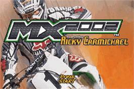 Title screen of MX 2002 featuring Ricky Carmichael on the Nintendo Game Boy Advance.