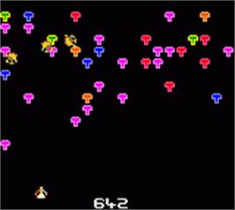 In game image of Centipede on the Nintendo Game Boy Color.
