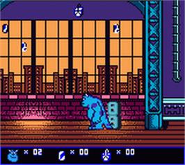 In game image of Monsters, Inc. on the Nintendo Game Boy Color.